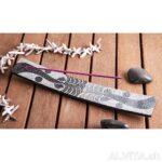 Support en stéatite, noir avec motif